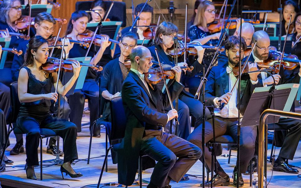 Philharmonia Orchestra first violins in concert at the Royal Festival Hall