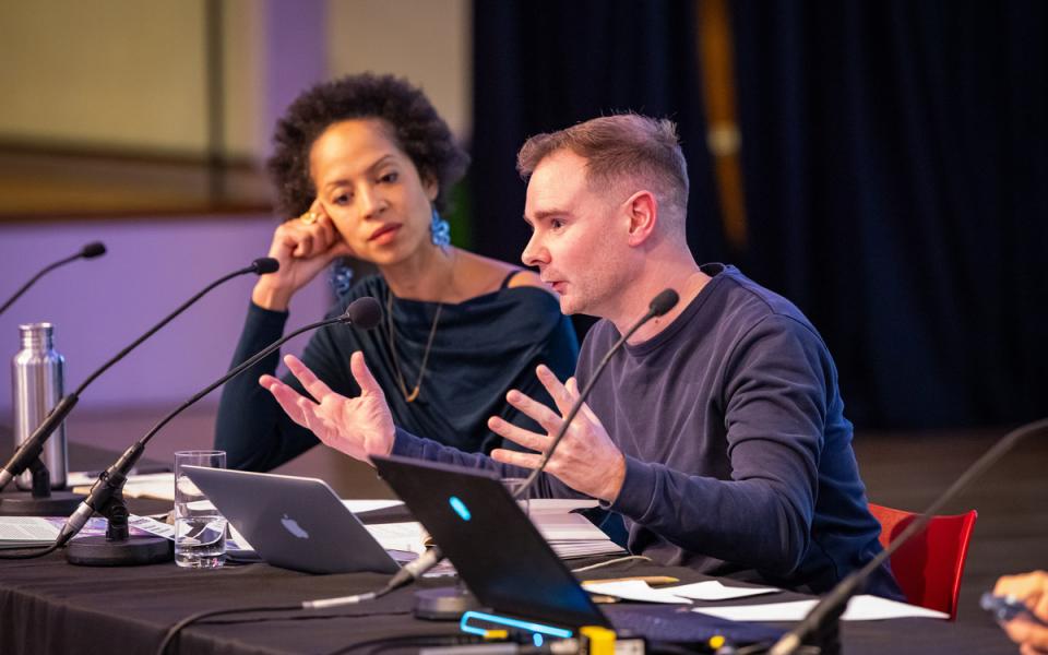 Man talking into a microphone