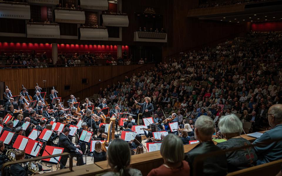 Wide shot of Santtu-Matias Rouvali conducting the Philharmonia at Royal Festival Hall